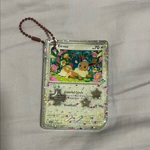 Pokemon Eevee Trading Card with Glitter Keychain - Multicolor